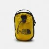 The North Face BOZER CROSS BODY UNISEX - Across Body Bag - Mineral Gold/black