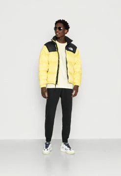 The North Face RETRO NUPTSE JACKET UNISEX - Down Jacket - Yellowtail